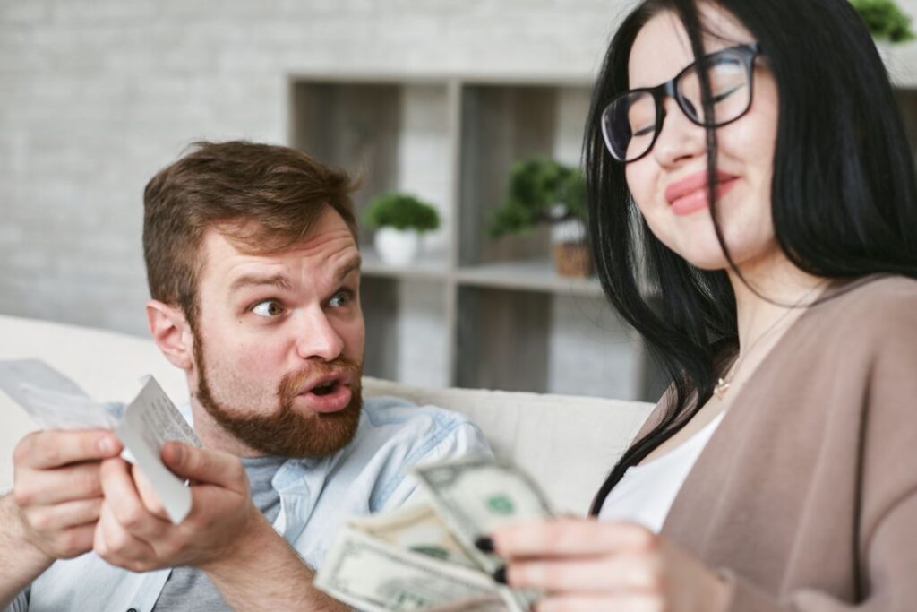 A picture showing two Couples discussing the right way to managing money as a couple