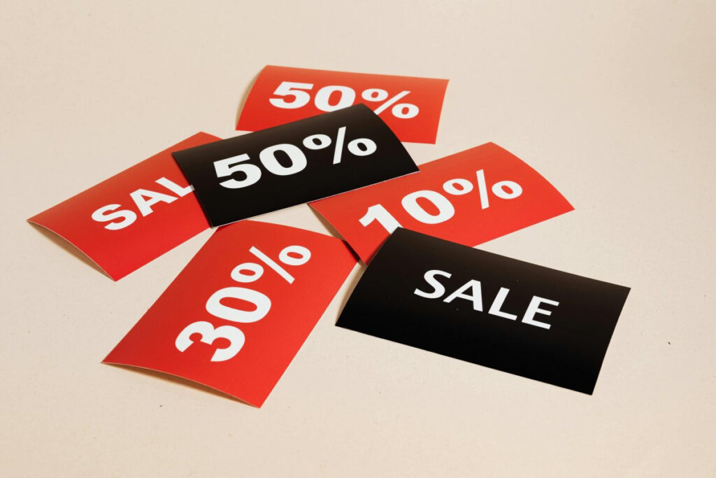 A picture showing sale Cards on Beige Background
