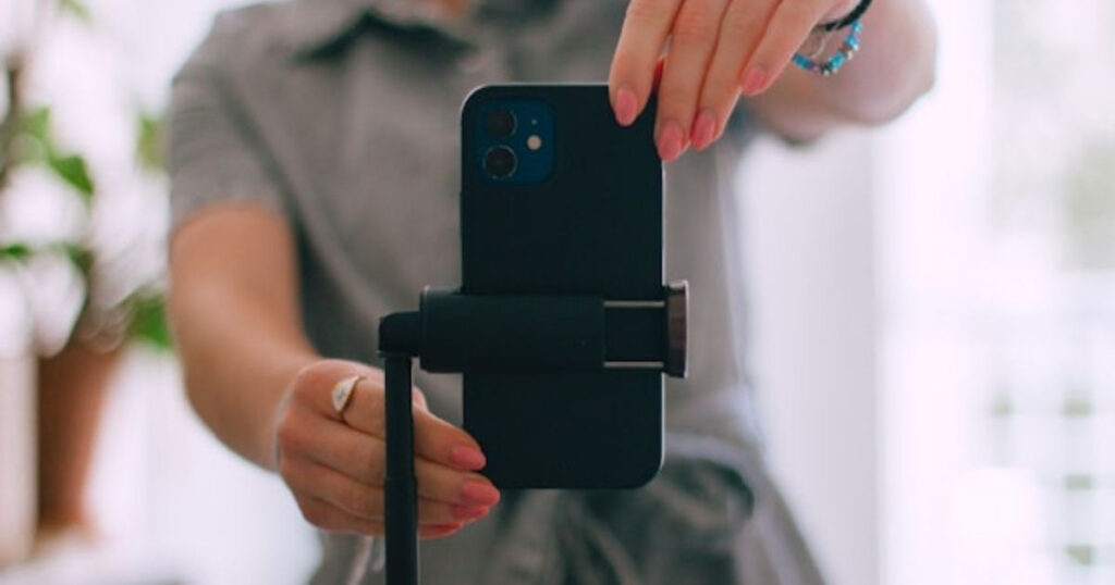 A picture of someone setting their camera to make money from TikTok