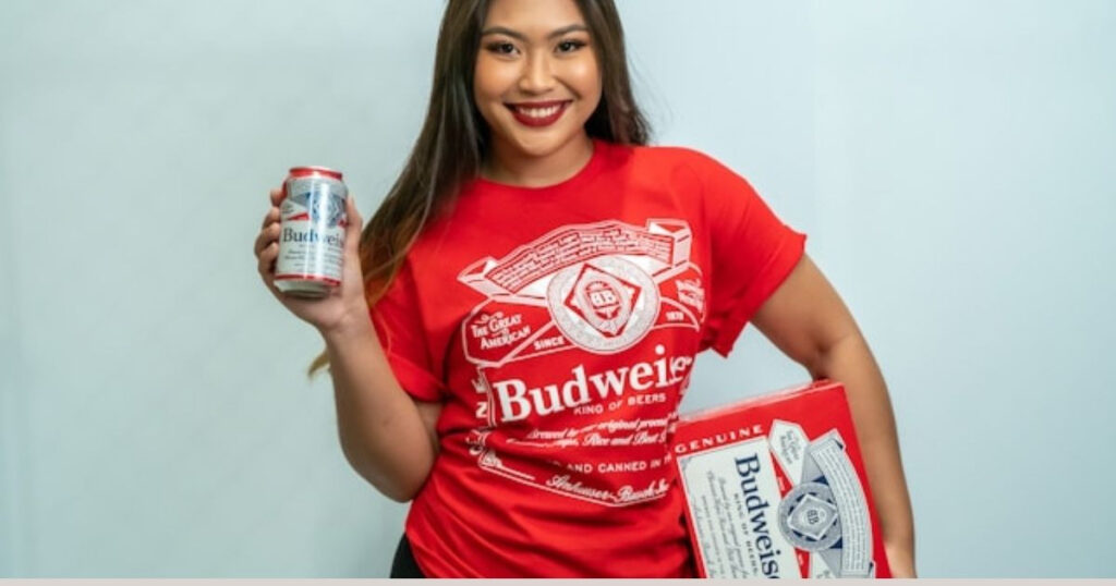 A picture showig a lady who did a brand partnership with Budweiser to make money on YouTube