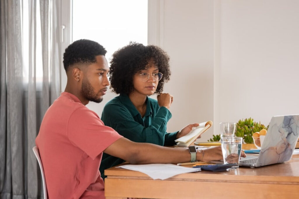 An image showing Couples saving money in a piggy bank using the Three-Bucket System for Couples to manage shared and personal finances.