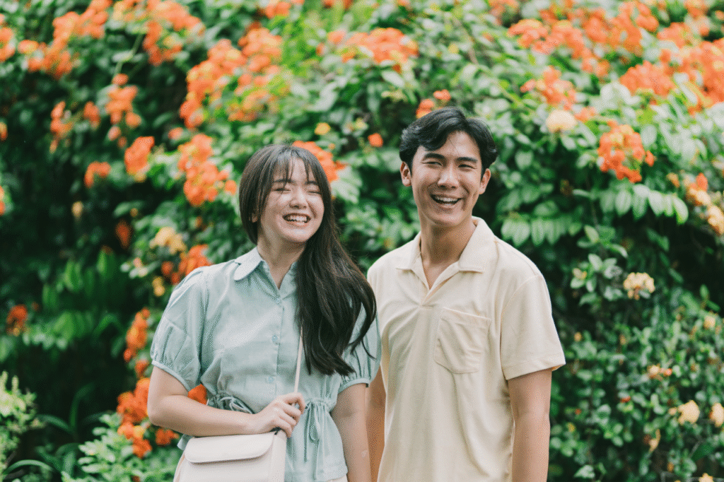 An image showing young couples smiling widely