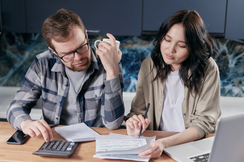 An image showing couples sitting across each other to talk about finances in a relationship